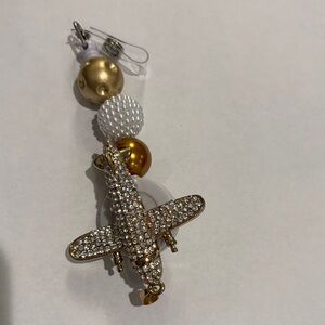 Gold and White Airplane Badge Reel